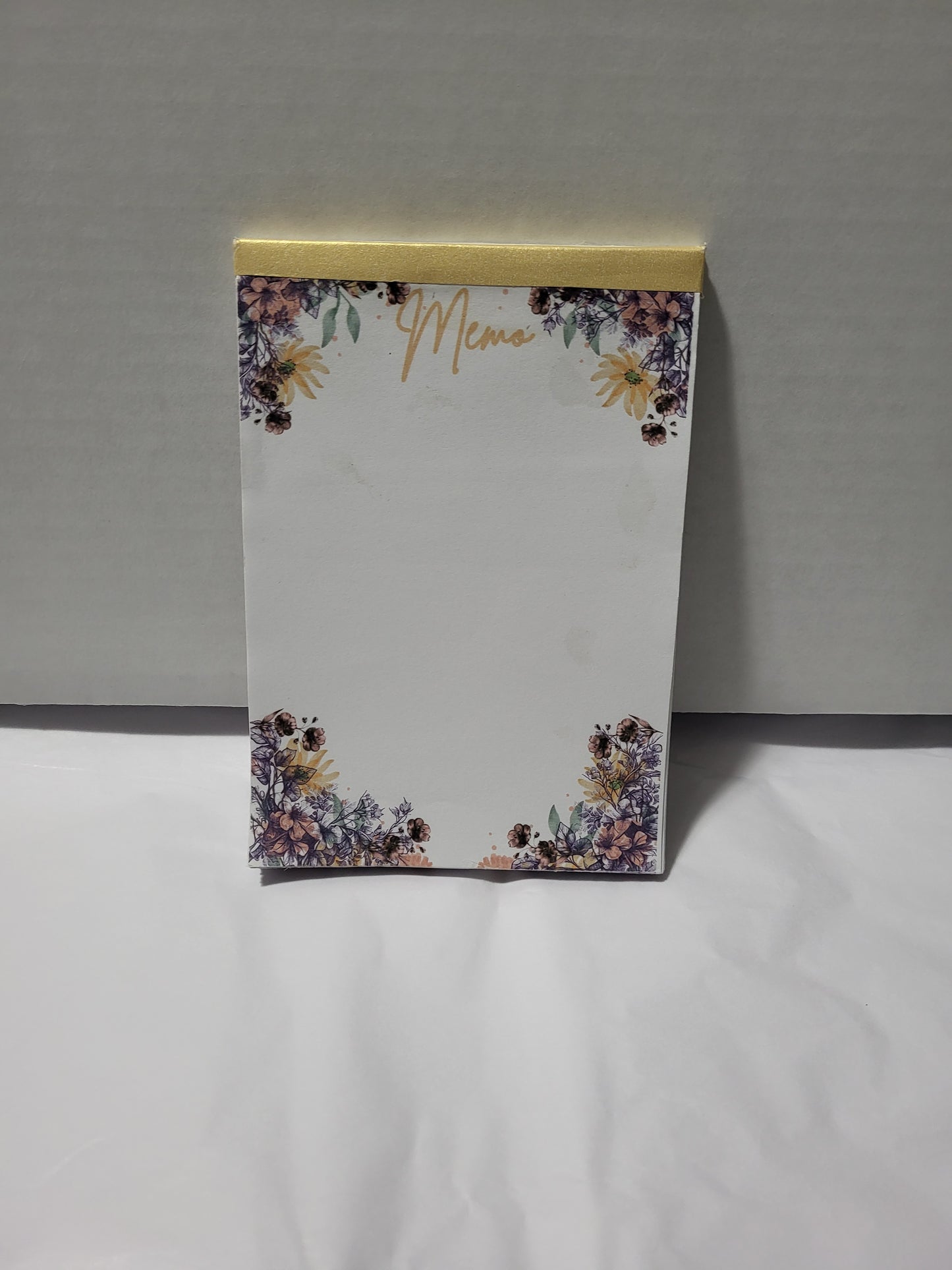 Purple flowery notepad