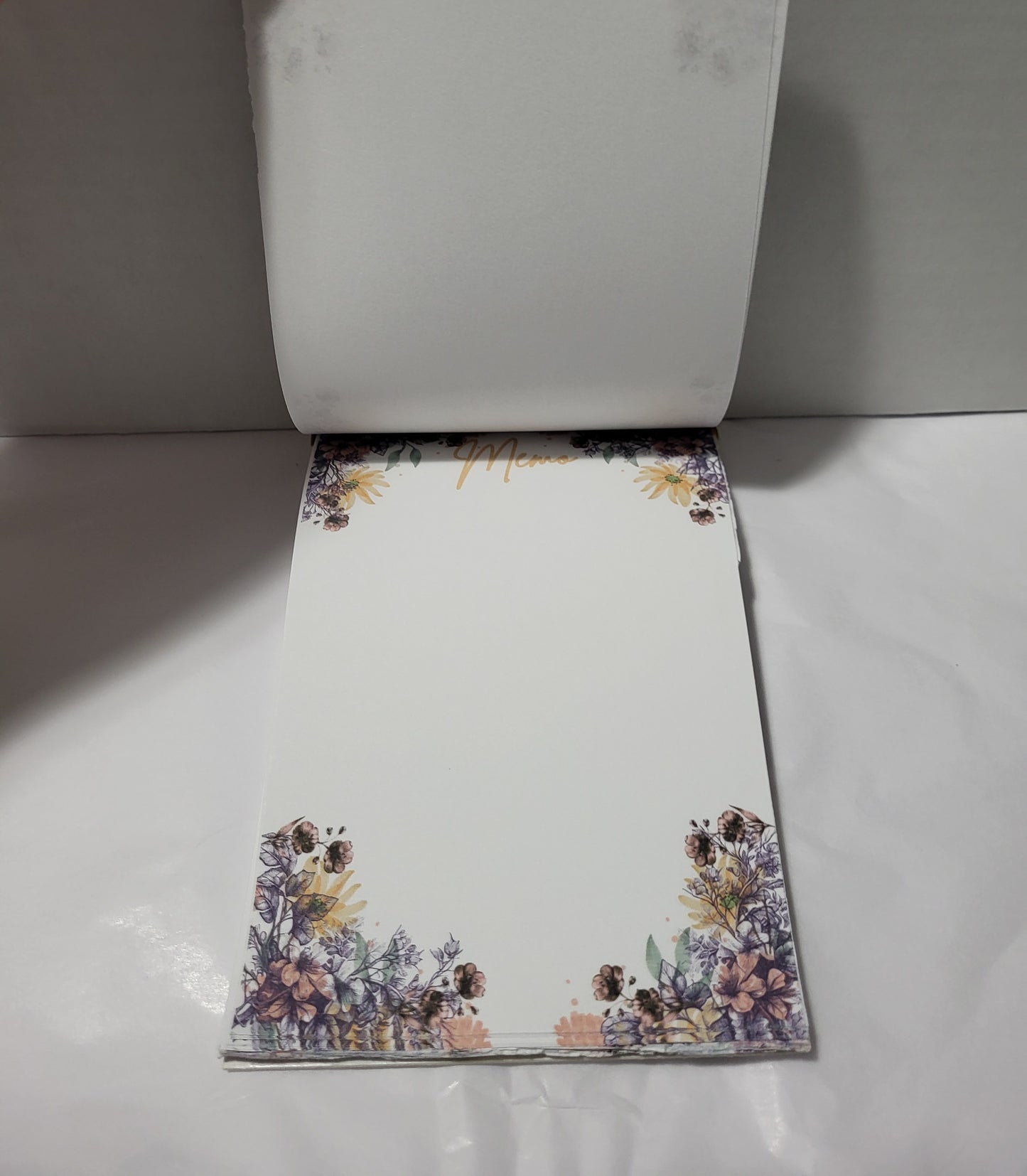 Purple flowery notepad